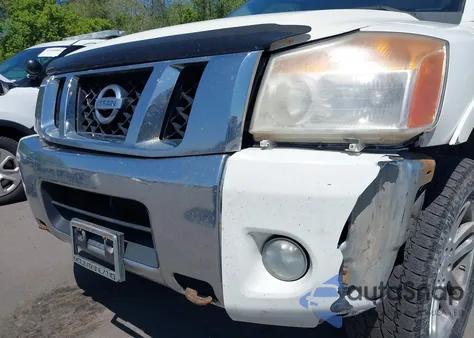 2012 Nissan Titan Pro-4X/S/Sl/Sv z USA, uszkodzony, nr VIN 1N6AA0EC3CN330627